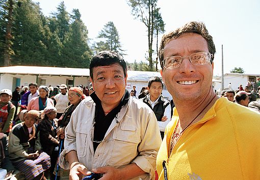 Dr. Sanduk Ruit and Dr. Geoff Tabin await results at a rural eye camp.
